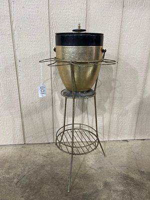 Mid Century Ice Bucket Stand. Black and gold on wrought iron stand. Ice bucket is in good 