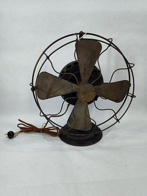 Pre 1908 GE Pancake Motor Fan. Has a nice ornate look! Runs but slowly. Cage is 12in in diameter.