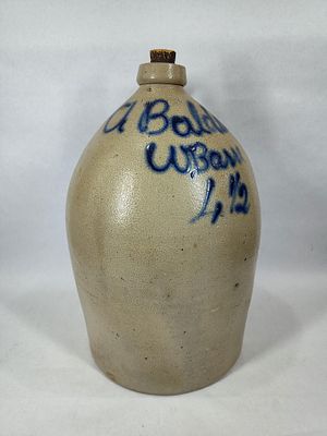 Evan R. Jones 5gal stoneware jug. With a chip on base and a few minor blemishes on side, may be 