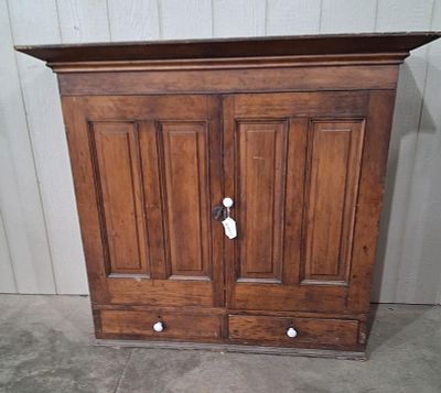 Raised Panel 2 doors over 2 drawers cabinet. 49in wide 16in deep both at top crown 45.5in tall.