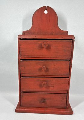 Primitive painted 4drw hanging cabinet. 12in wide 6in deep 25in tall.