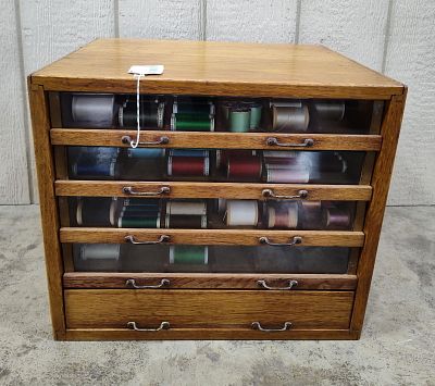 Country Store Oak 5drw spool cabinet. Loaded with spools and silks! 18in wide 15.5in deep 15.5in 