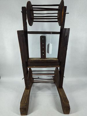 Very early primitive double yarn winder. 11in wide 24in tall.