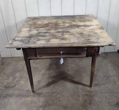 Early primitive 1 drawer table. Shows areas of condition but is early!! 3 plank top. Top is 39in 