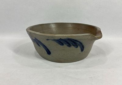 Decorated stoneware batter bowl. Does have some spidering hairlines through bottom and a chip on 