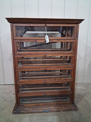 A.N. Russell & Sons Co Country Store Oak Ribbon cabinet. Beautiful Oak cabinet with a few small 