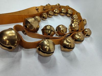Strand of double graduated brass sleigh bells. 25 polished brass bells on leather belt. Great 