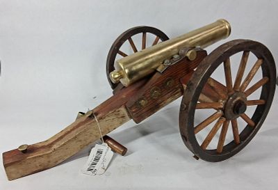 Model polished brass cannon. Believed to be a functional cannon with heavy brass barrel, 10.5in 