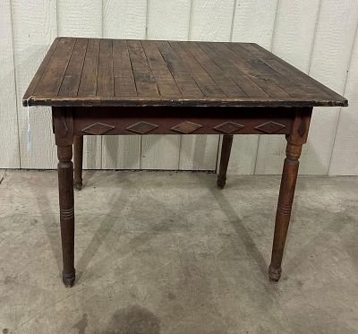 Early Mercantile slat top table. With tramp art diamond design applied carved pieces around 