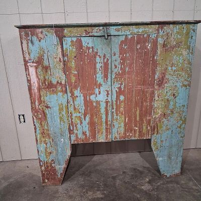 Primitive painted 2 door cabinet. With great multi colored paint and has rot on right side 