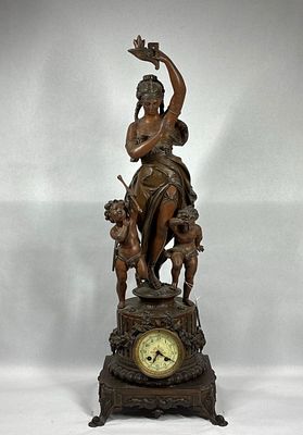Stunning French Empire Poiten Goddess Figural Clock. Bronze Goddess with robe and torch, along 