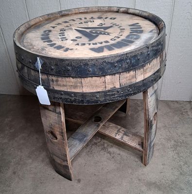 Whiskey barrel end table. 22in diameter 24.5in tall.