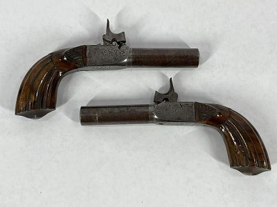 Pair of Finely Engraved Boxlock .50 Cal Percussion Pistols. Gentlemans pistols with Damascus 