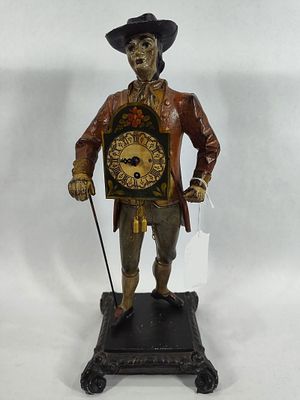 Contemporary cast JVE figural clock. Clock is not running but displays well. 16in tall.