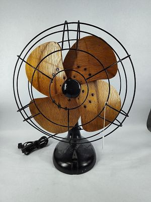 Early restored wood bladed electric fan. Is not marked, unsure the maker but has a great look 