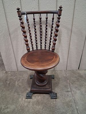Beautiful Victorian Barley Twist Back Piano Stool. With brass claw feet. Base shows some patina 