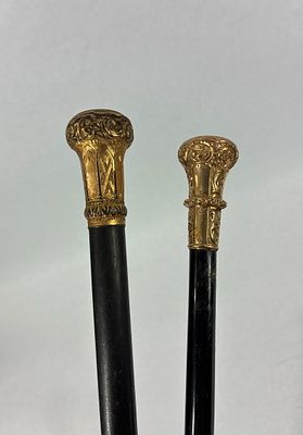 2- Victorian Gold Filled Etched Canes/Walking Sticks. Both with ornate gold filled tops and Both 
