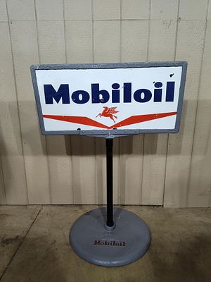 DSP Mobiloil curb sign. 2-sided porcelain sign that shows a few small hits to either side 