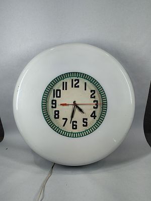 Original Lima Neon working clock. Original clock with plastic cover, metal dial and backer in 