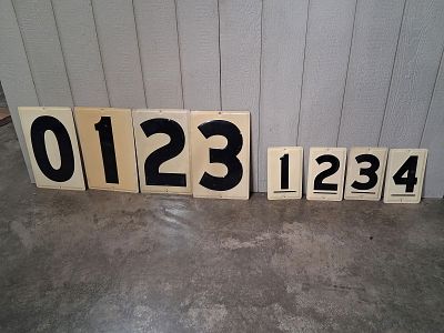 8- SST Embossed Number signs. These are 1-sided painted metal embossed signs. Includes 4-Larger 