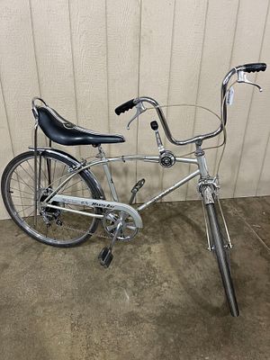Schwinn Manta-Ray 5-speed Bicycle. Shows a minor areas of paint wear and a few pieces of tape on 