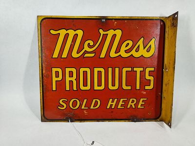 DST McNess Products Sold Here flange sign. 2-sided painted metal flange sign that has 