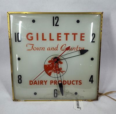 Gillette Town and Country Dairy Products Pam clock. Shows paint wear to reverse painted glass 