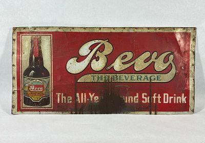SST Bevo Beverage sign. 1-sided painted tin sign that has been cut at bottom, shows corrosion 