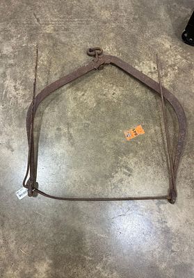 Early metal sign hanger. 27.5in wide.