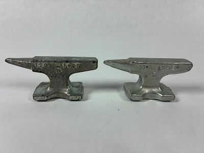 Portland Forge Mini Anvils. Cast iron 1909-1987 and 1988. Both are 3 inches