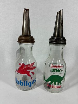 Sinclair and Mobiloil Glass Oil Bottles. This is a newer pair. Each approx 14 inches tall