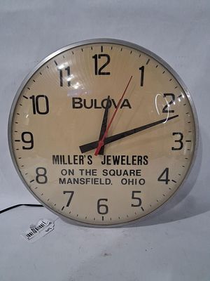 Millers Jewelers Mansfield Ohio Clock. Bulova brand. glass bubble face. 15 inch diameter. In 