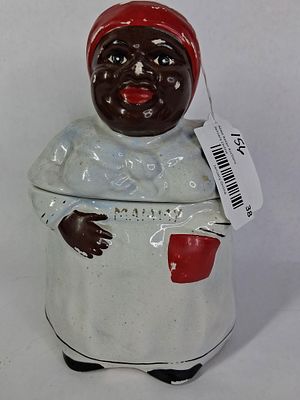 McCoy Pottery Mammy Cookie Jar. Showing paint loss only with no chips, flakes, cracks or breaks? 