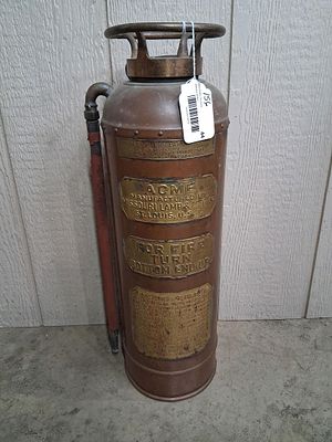 Acme Missouri Lamp & Mfg. CO Brass / Copper Fire Extinguisher. showing tarnishing as well as 