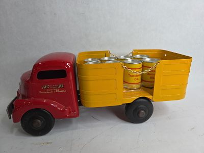 Smitty Toys Smith Miller Stake Bed Delivery Truck w/ Shell Motor Oil Barrels. Great overall condition