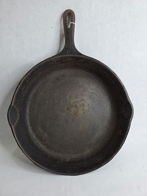 Wagner Ware Cast Iron No. 10 Skillet. Showing rusting as well as finish loss due to age and 