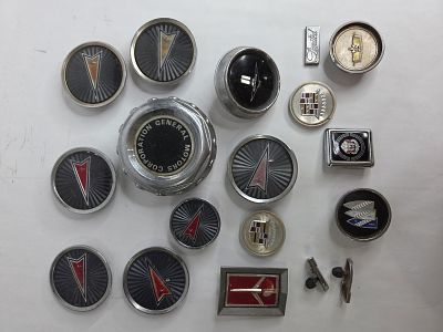 Automobile Emblems, Center Caps, Steering Wheel Horn Inlays and More. This great automotive lot 