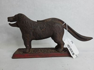 Antique Cast Iron Nut Cracker Dog. good overall condition with some paint / finish loss due to 