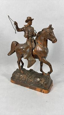 Bronze Cowboy with Rope on Horseback. A great western piece, complete with rope lasso. Cowboy 
