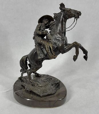 The Bronco Buster Bronze Figure. A Casting from Frederic Remington's most famous piece. Artist 