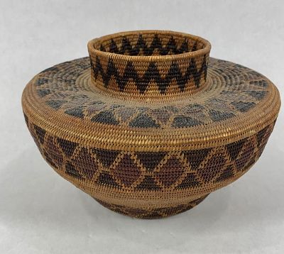 Hand Woven Rattlesnake Bottleneck Basket. Created by the Yokuts people Native American tribe. 