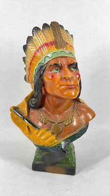 Chalkware Iroqi Native American Chief. Iroqi stamped to front with vibrant color. A small chip 