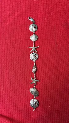 Bold Beach Life Sterling Silver Seashell Bracelet. .925, weighing 15.3 grams