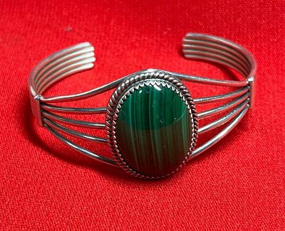 Malachite Sterling Cuff Bracelet. Large 1 inx.75 in green stone. Marked sterling. 2.25 in 