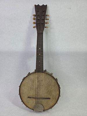 1920's Open Back Mandolin 8 String Banjolin. Showing rusting as well as strings in need of 