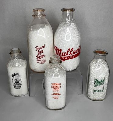 Round Hill Farm, Mullens Dairy, Deeds Bros.,Steels & Shoemake Guernsey Farms Dairy Bottles. This 