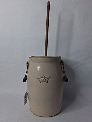 Two gallon crown butter churn crock with dasher. wooden handles/lid/ and dasher in very good 