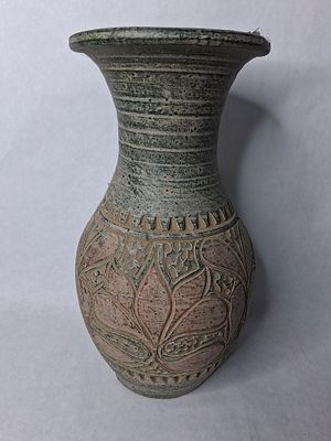 Handcrafted earthenware engraved clay vase. Likely made in south or Southeast Asias in very good 