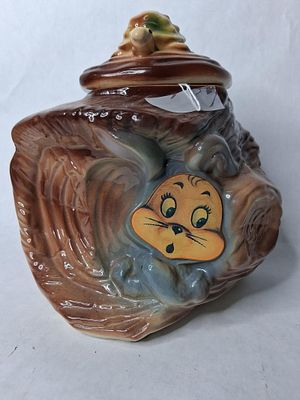 UniqueTortise and Hare flasher cookie jar. Hares eye open and close depending on what angle you 