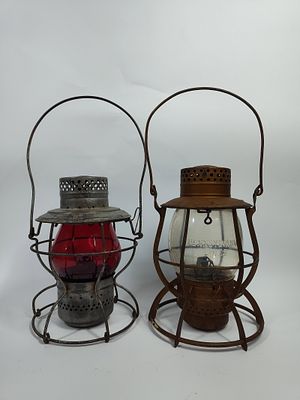 Pair of Railroad Lanterns. Handlan St Louis NYCS with red globe. Pennsylvania Lines embossed 